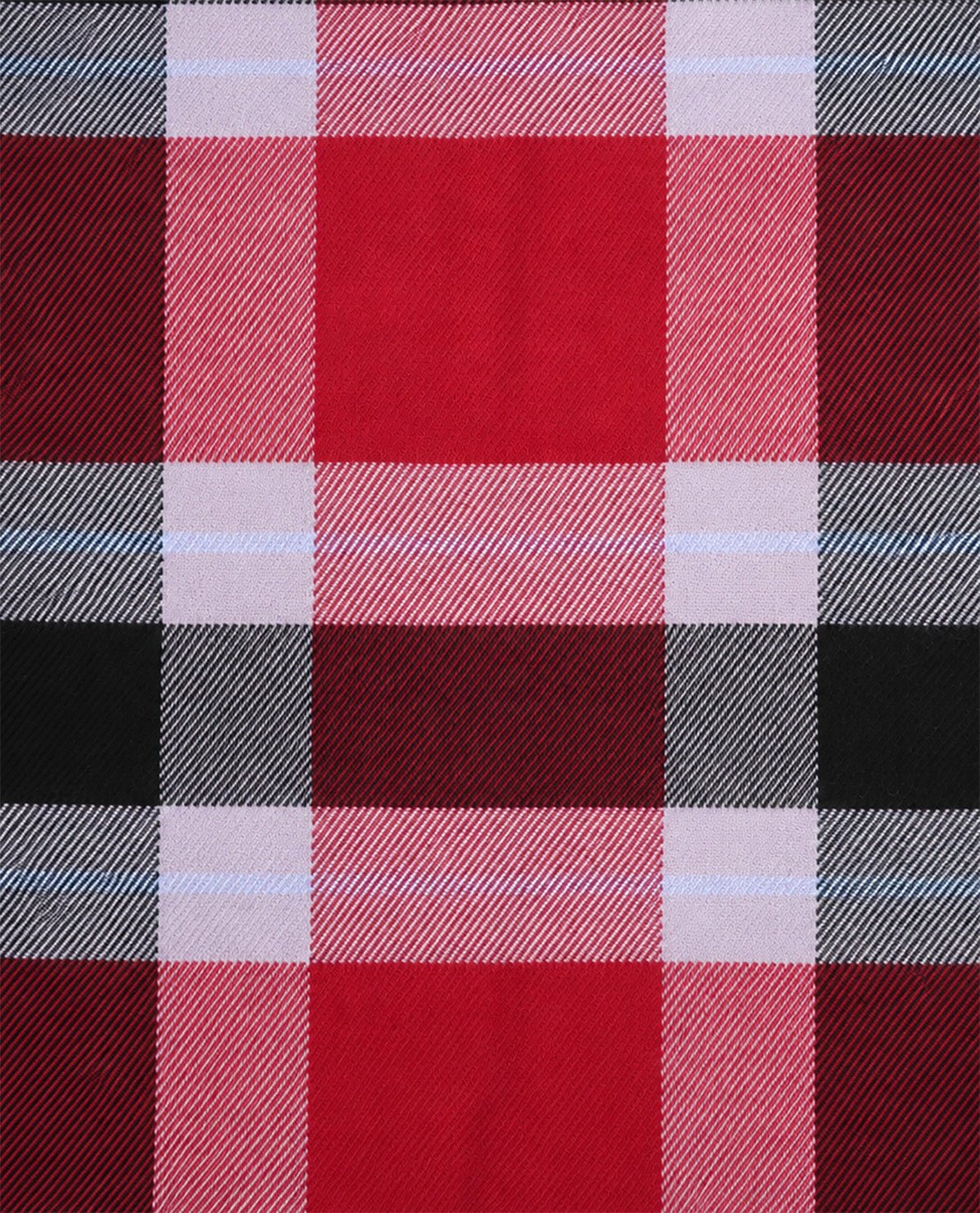 A close-up of a tartan plaid fabric pattern featuring red, pink, white, black, and gray stripes.