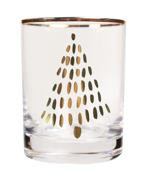 A clear glass tumbler with a metallic gold foil Christmas tree design on the front and a gold rim, shown against a plain white background.