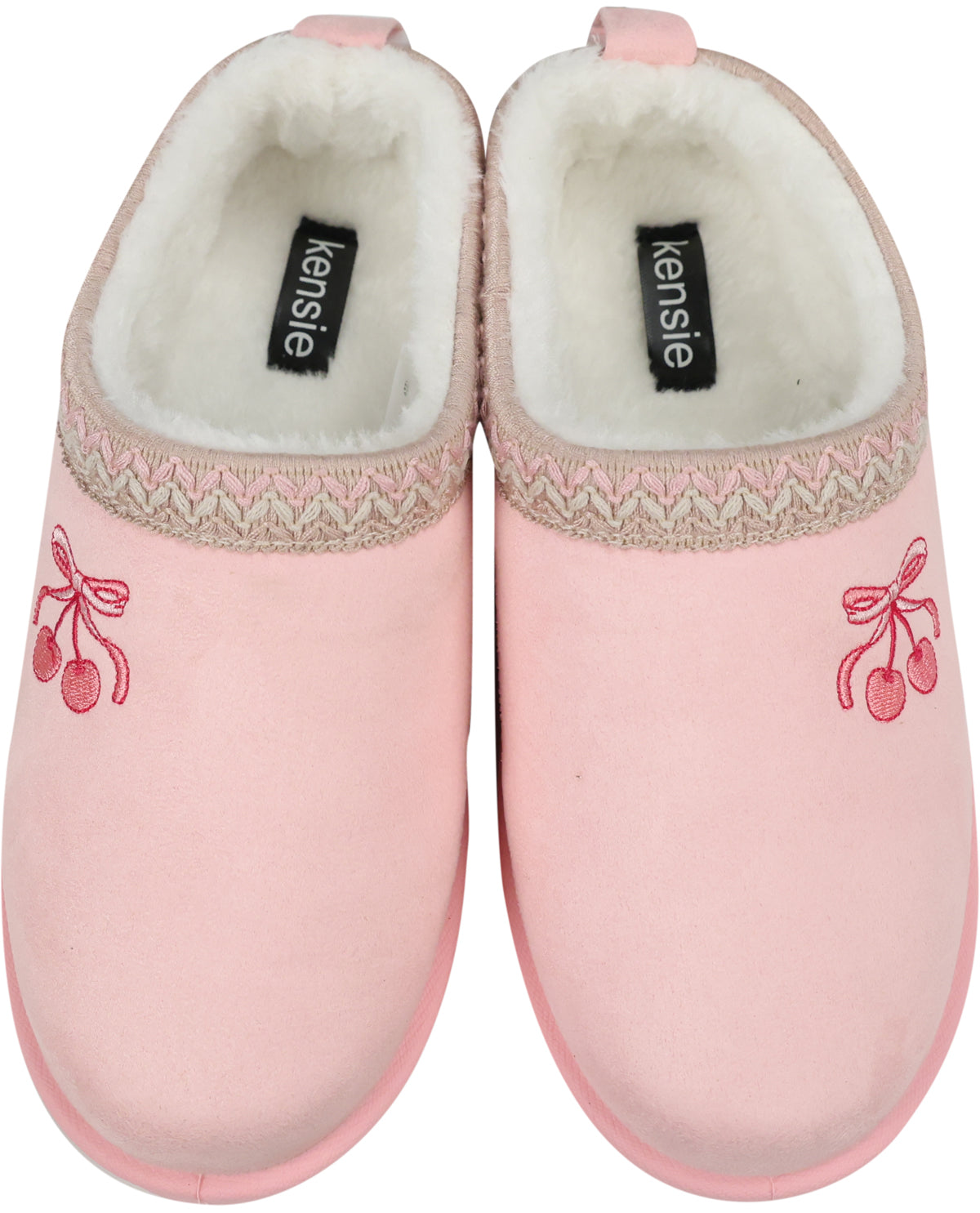 A pair of pink slip-on slippers with a white sherpa lining, a beige and pink patterned knit band, and pink cherry embroidery on the side. The brand name 'kensie' is visible on the black labels inside the slippers.