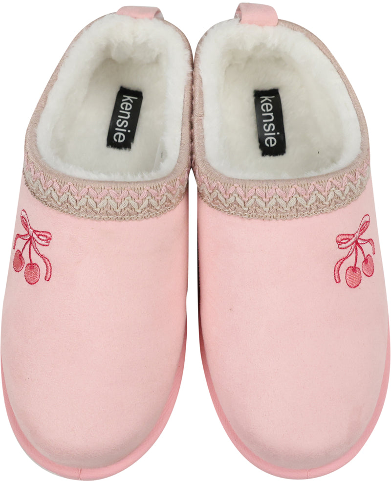 A pair of pink slip-on slippers with a white sherpa lining, a beige and pink patterned knit band, and pink cherry embroidery on the side. The brand name 'kensie' is visible on the black labels inside the slippers.