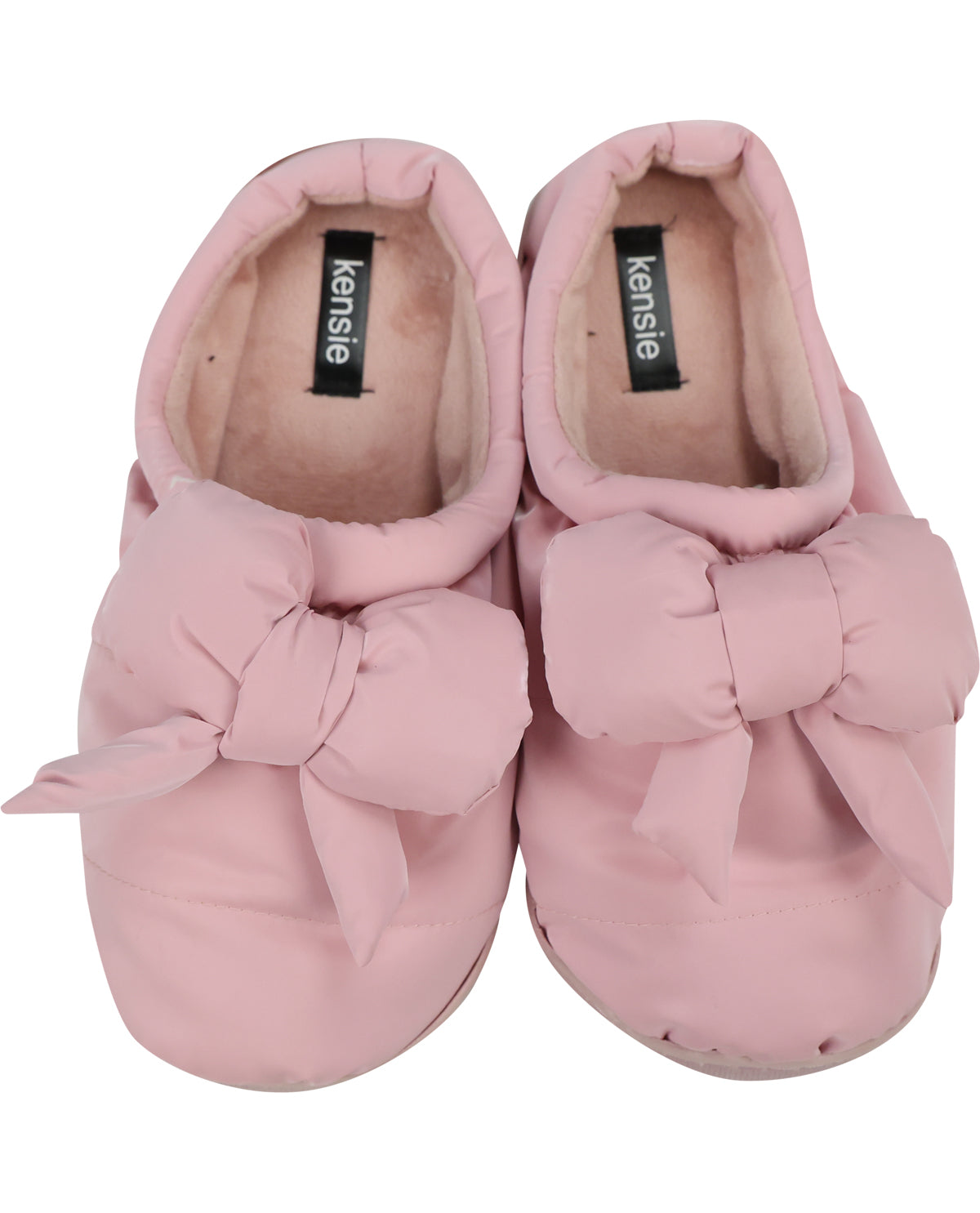 A pair of pink slip-on slippers with large fabric bows on the front, shown from a top-down view on a white background. The brand name 'kensie' is visible on the inner labels.