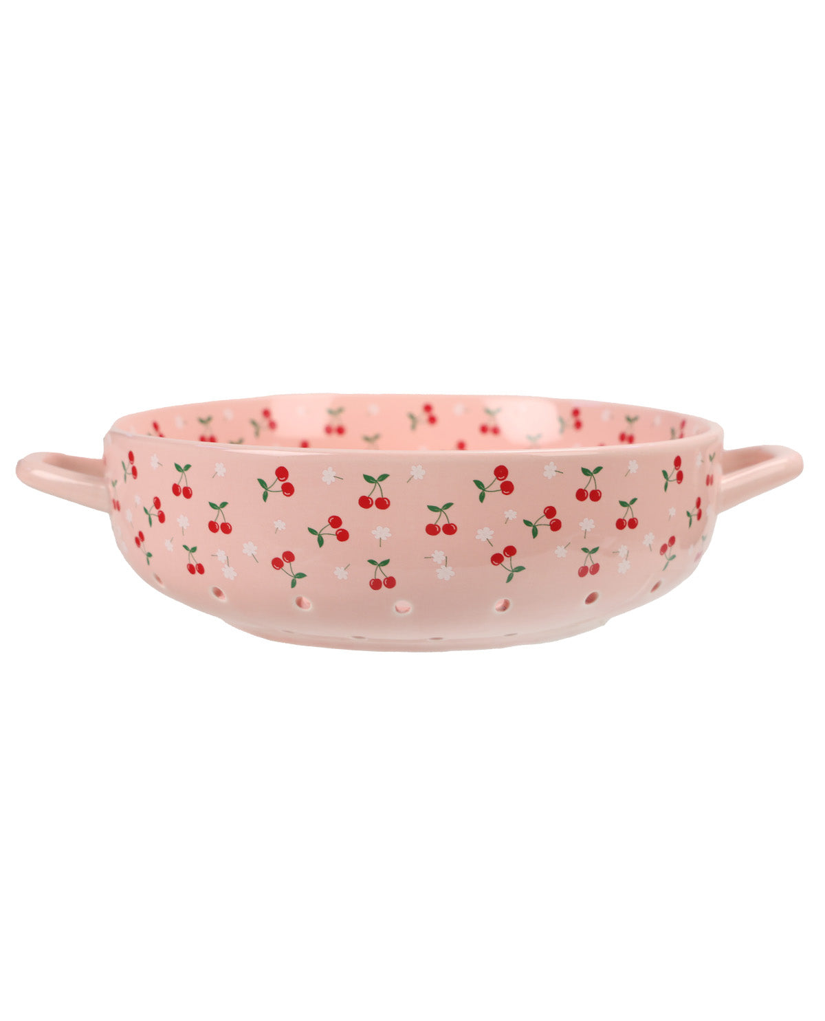 A pink ceramic serving bowl with two side handles, decorated with a repeating pattern of red cherries, white flowers, and green leaves on a plain white background.