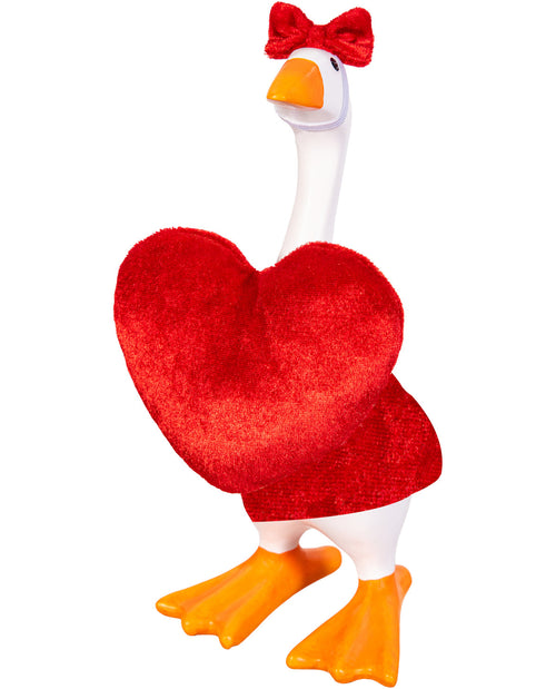 Plush toy goose with a red heart and bow on a white background