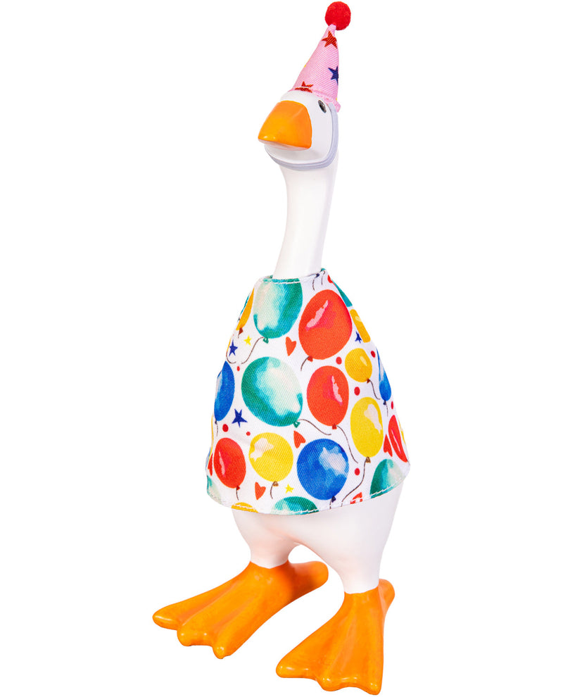 Colorful duck toy with a balloon pattern on a white background