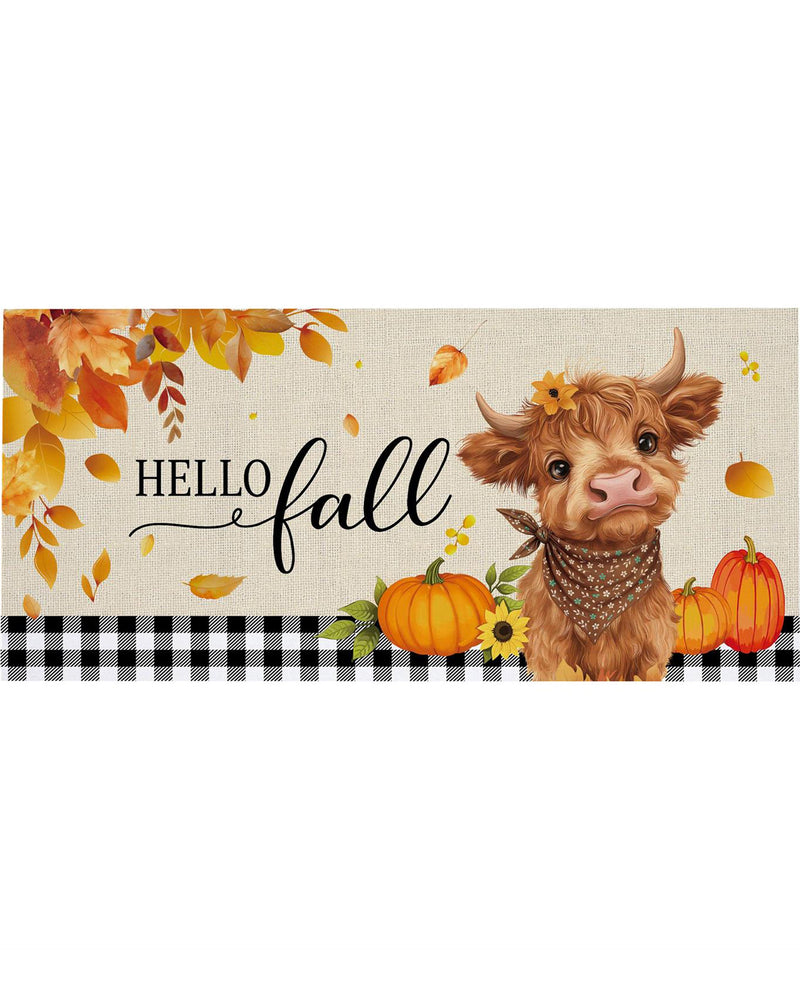 A rectangular fall-themed decorative sign or print with the words “HELLO fall” in black script, autumn leaves and leaves floating around, orange pumpkins, a brown highland cow wearing a bandana and flower crown, and a black-and-white gingham stripe across the bottom.