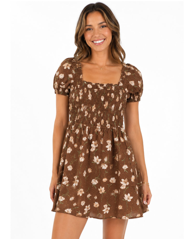 Missy model wearing a short sleeve mini floral brown dress