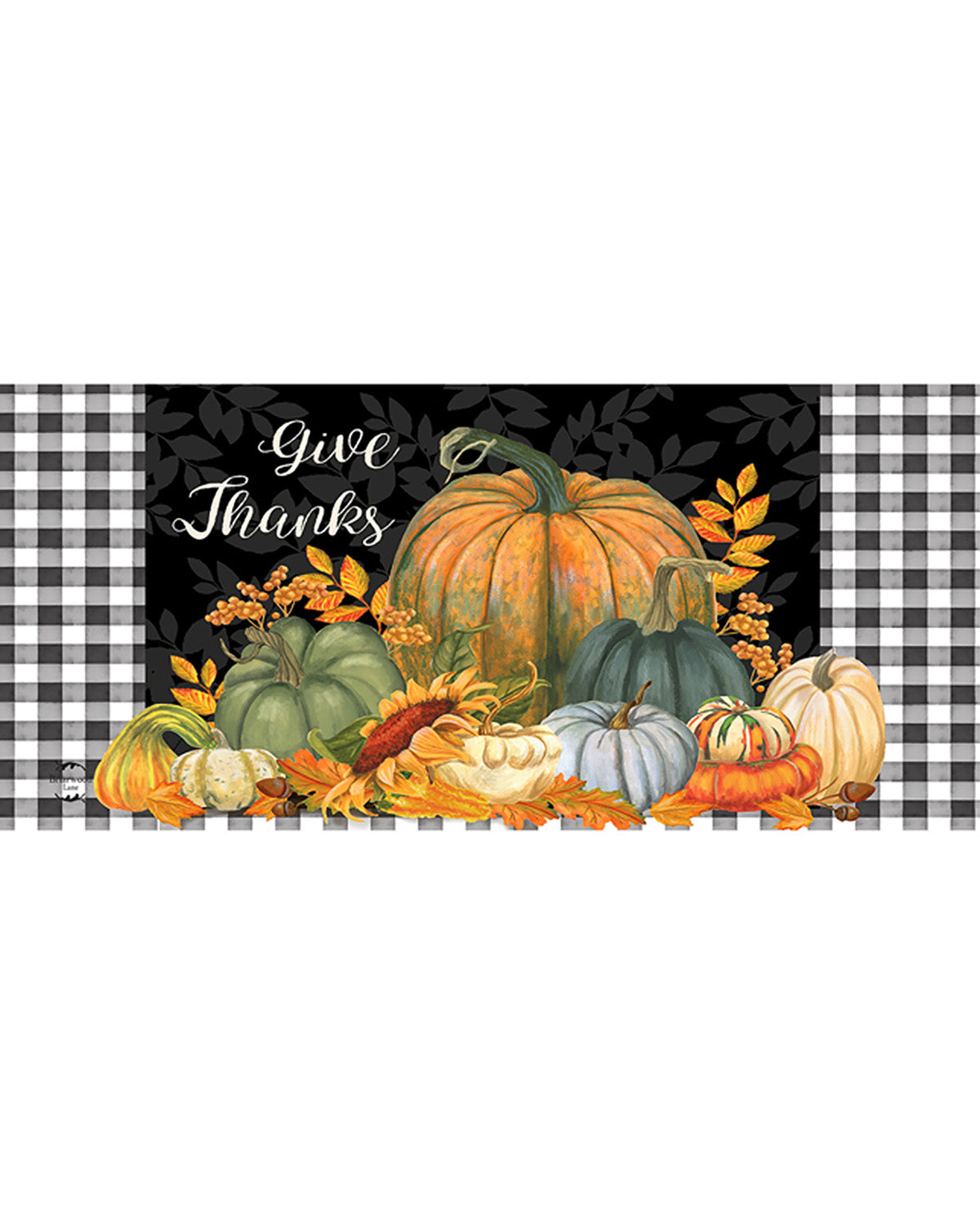 Decorative mat with pumpkins and leaves on a black background with 'Give Thanks' text, surrounded by plaid patterns.