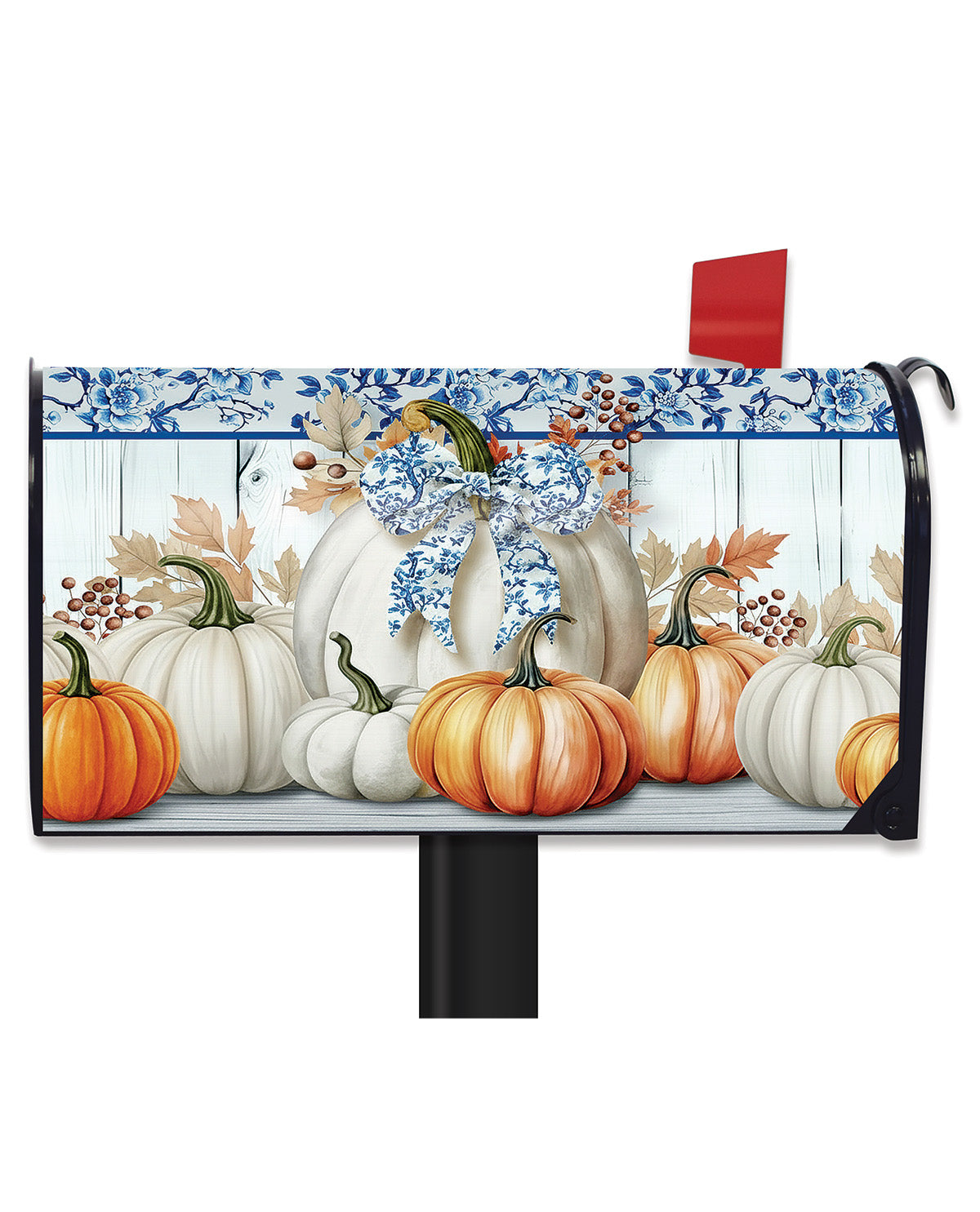 A decorative mailbox cover featuring a fall harvest design with orange and white pumpkins, blue floral border details, and a blue bow, shown mounted on a black mailbox against a white background.