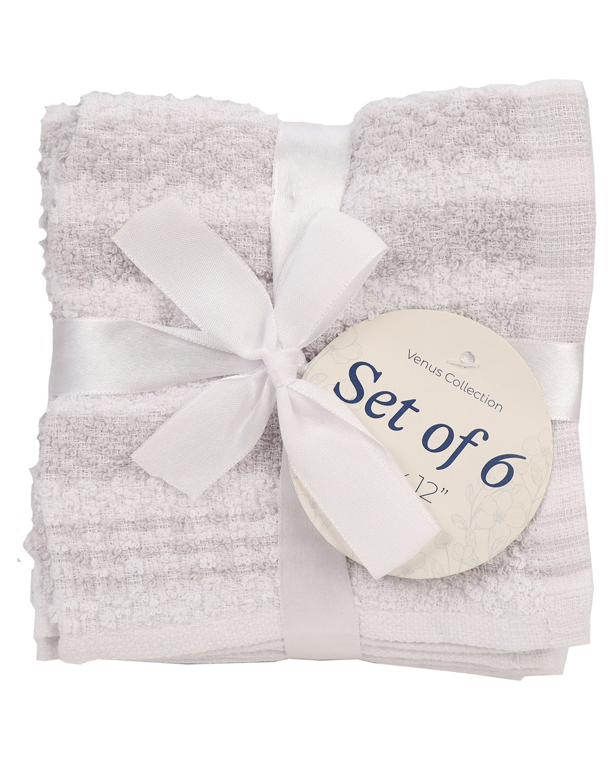 A set of six folded white textured towels wrapped in a white satin ribbon with a round tag that reads 'Venus Collection Set of 6 12"'.