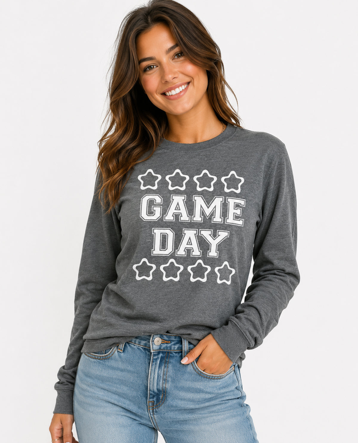 Woman wearing a gray 'Game Day' sweatshirt with stars on a white background