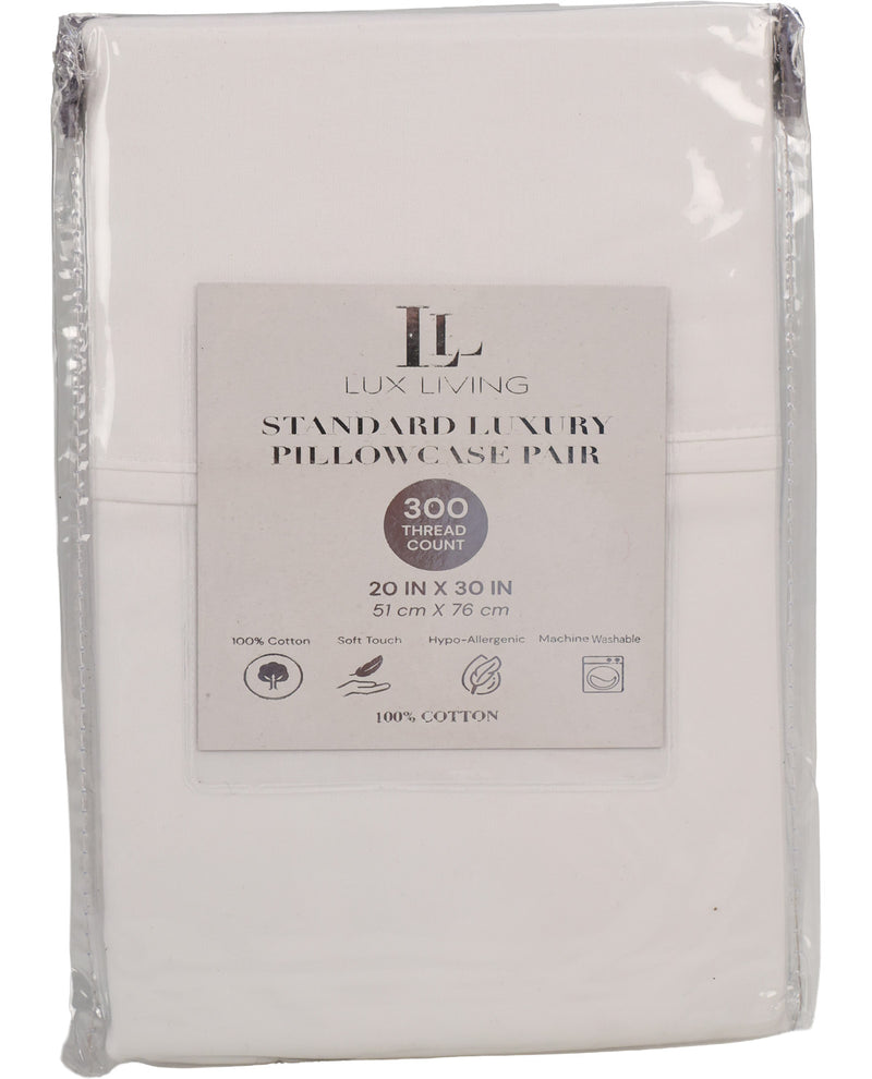A packaged white Lux Living Standard Luxury Pillowcase Pair, 300 thread count, 20 in x 30 in, sealed in clear plastic with a white product label on the front.