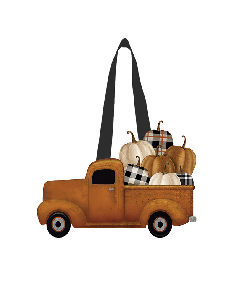 Decorative brown truck with pumpkins and a black strap on a white background
