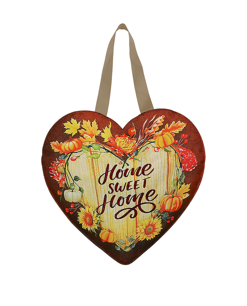 Heart-shaped decorative sign with 'Home Sweet Home' text and autumnal design on a white background