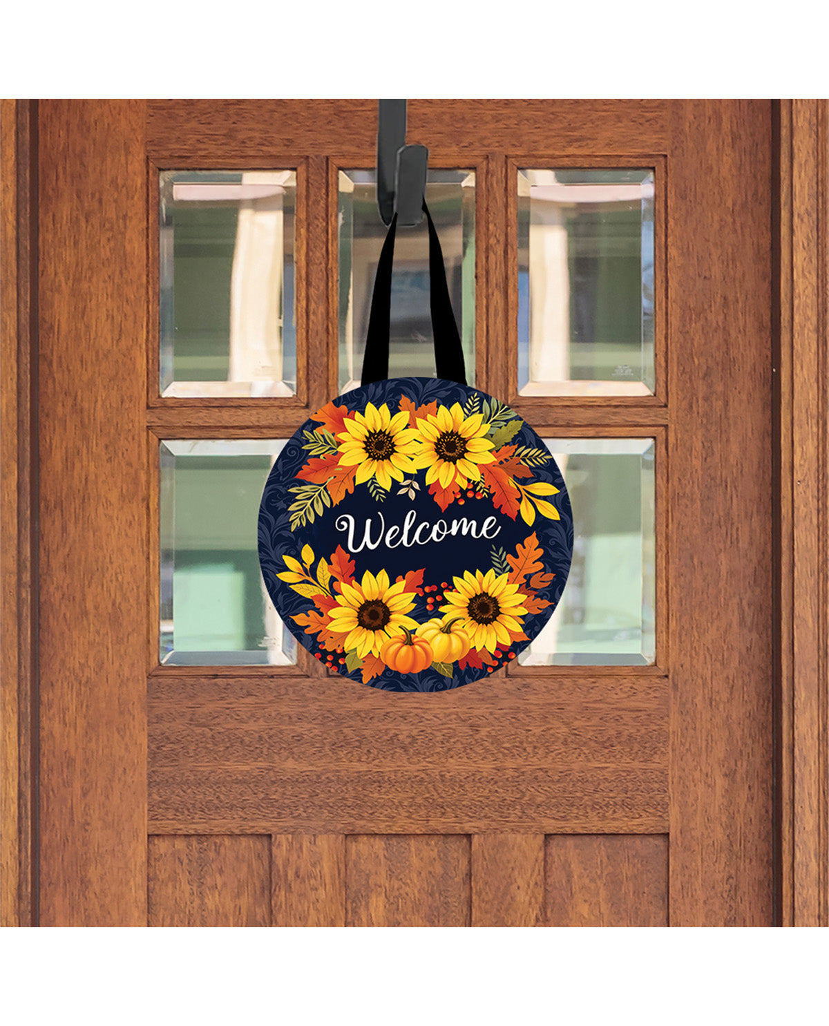 Decorative door hanger with sunflowers and 'Welcome' text on a wooden door.