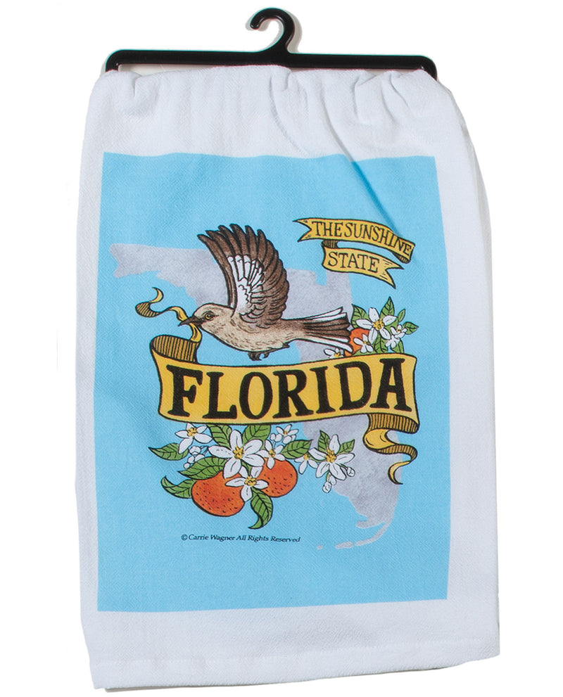 Towel with Florida-themed design featuring a bird, flowers, and oranges on a blue background.