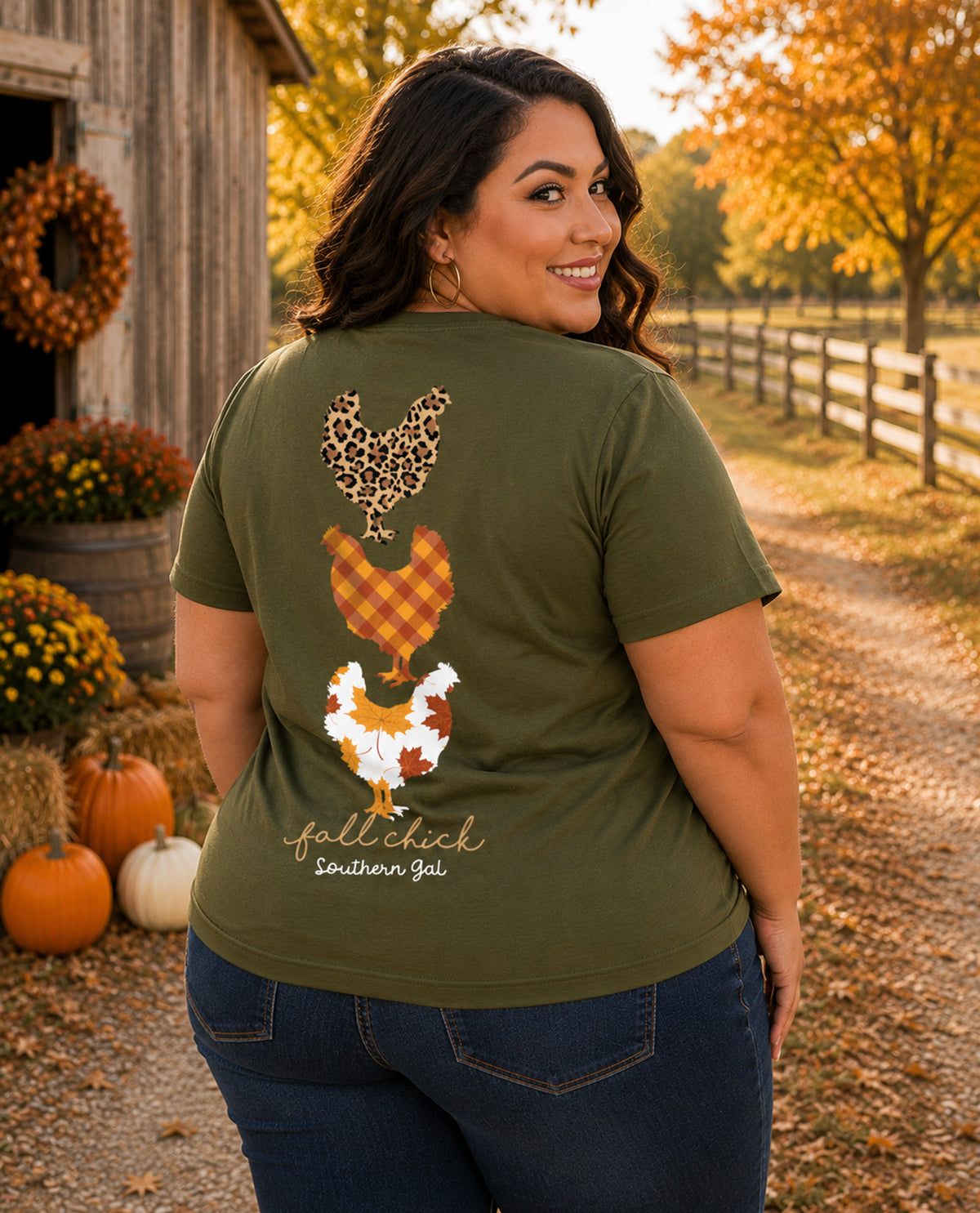 Woman wearing a green t-shirt with chicken designs and text in an outdoor setting.
