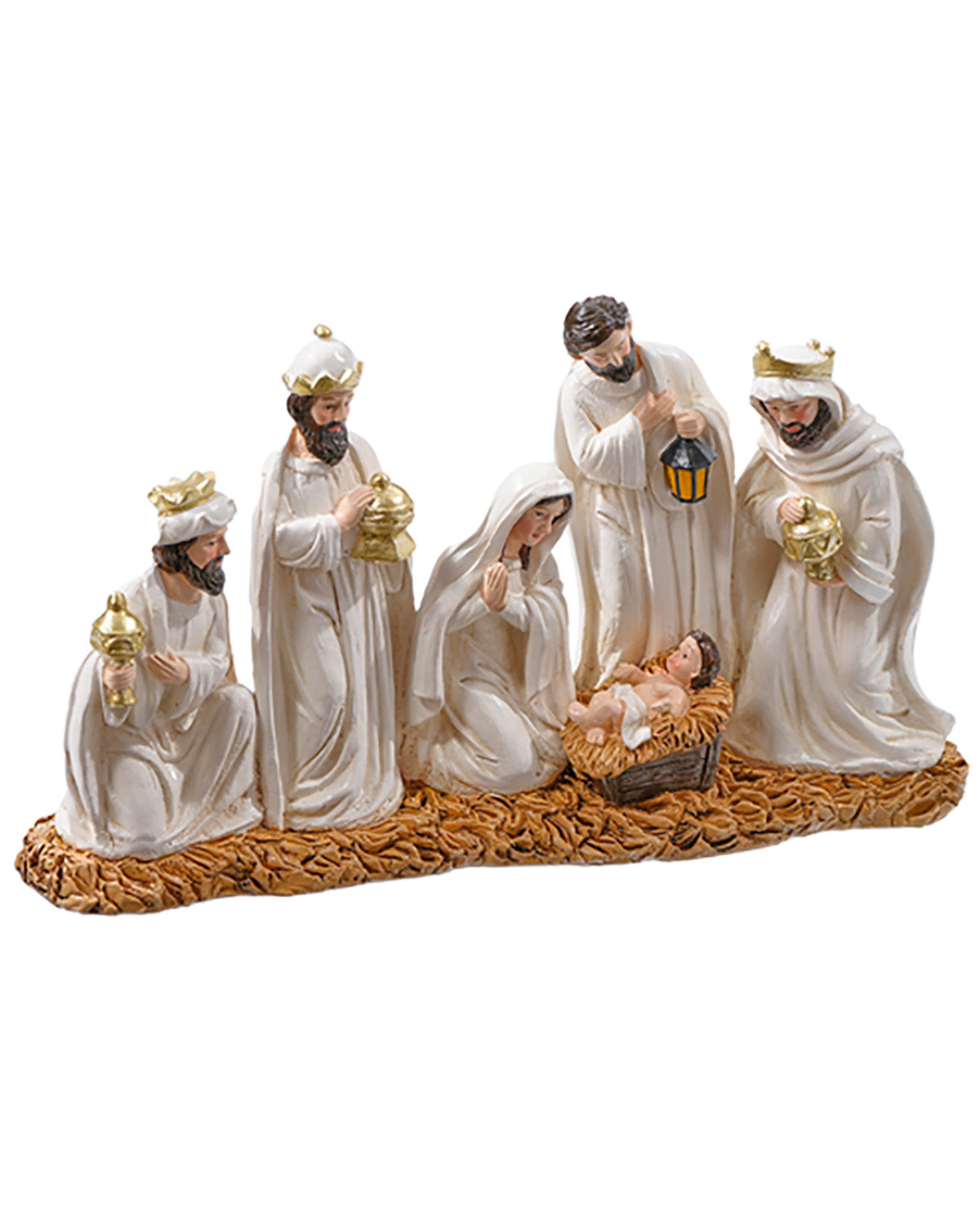 Nativity scene figurine with three wise men and baby Jesus on a white background