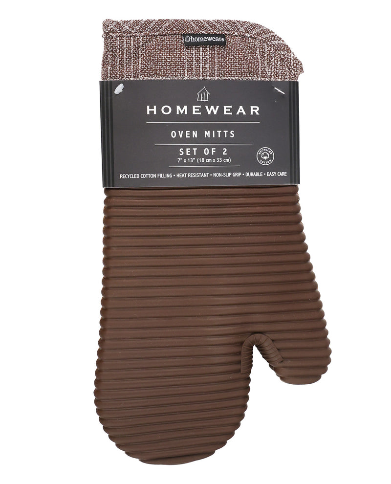 A set of two brown oven mitts from the brand Homewear, packaged with a black cardboard header. The mitts feature a ribbed texture and a matching brown and beige plaid cuff.