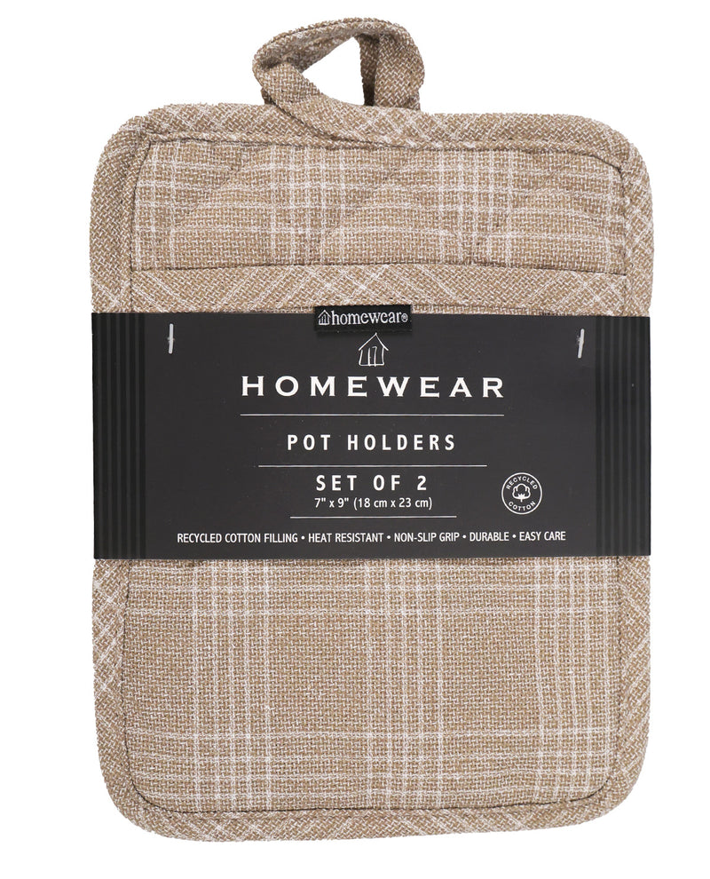 A set of two beige pot holders with a subtle plaid pattern, wrapped in a black paper band labeled 'Homewear Homewear Pot Holders Set of 2'.