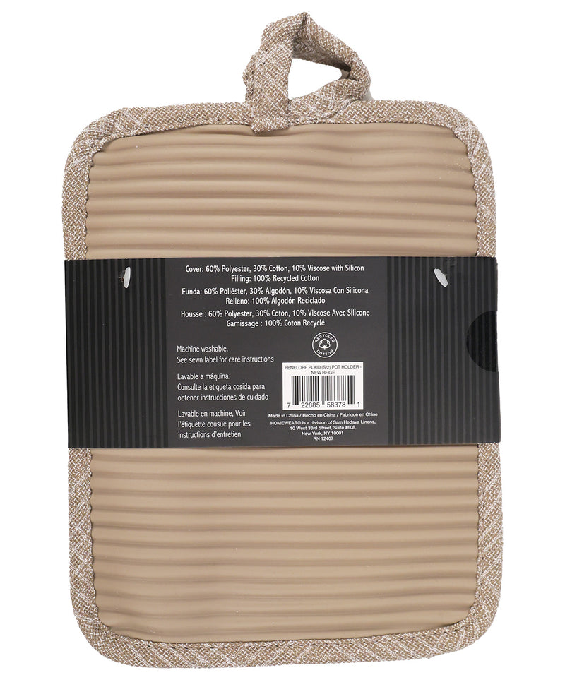 A beige ribbed kitchen pot holder with a matching woven trim and handle, wrapped in a black protective paper band showing product details and a barcode.