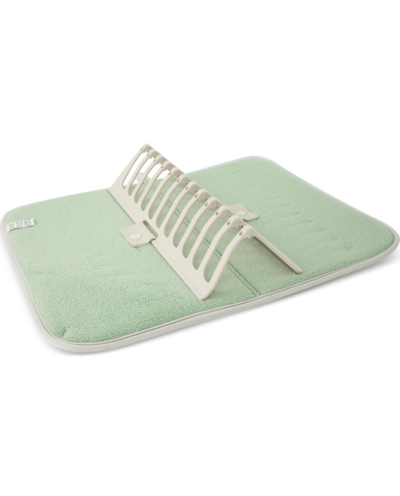 A light green textured baby blanket with a cream-colored fold-down storage basket, shown on a clean white background.