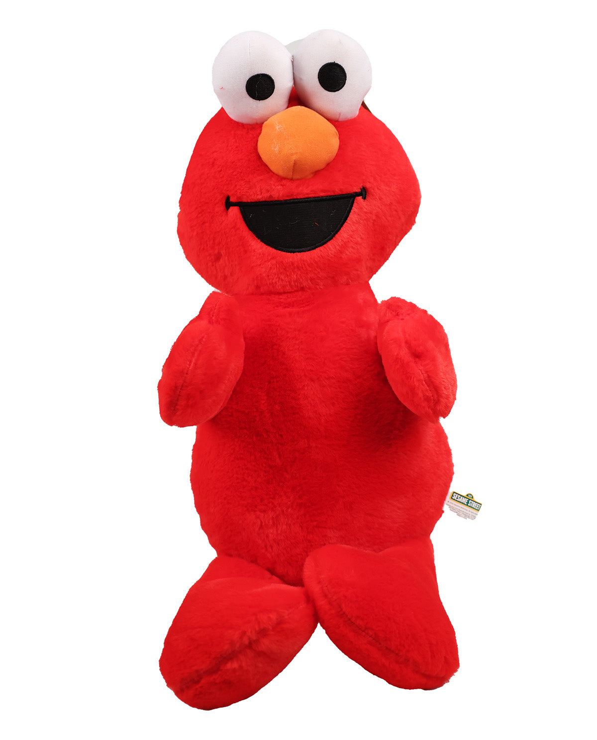 A red plush toy resembling Elmo from Sesame Street, featuring large white eyes with black pupils, a bright orange nose, a black stitched smile, and a small Sesame Street tag on the lower right side, shown against a plain white background.