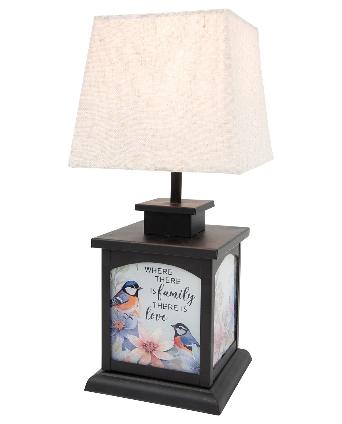 A square table lamp with a dark brown wood-look base featuring a front panel with a bird and floral illustration and the text 'WHERE THERE IS family THERE IS love'. It has a beige fabric drum shade and a black stem.