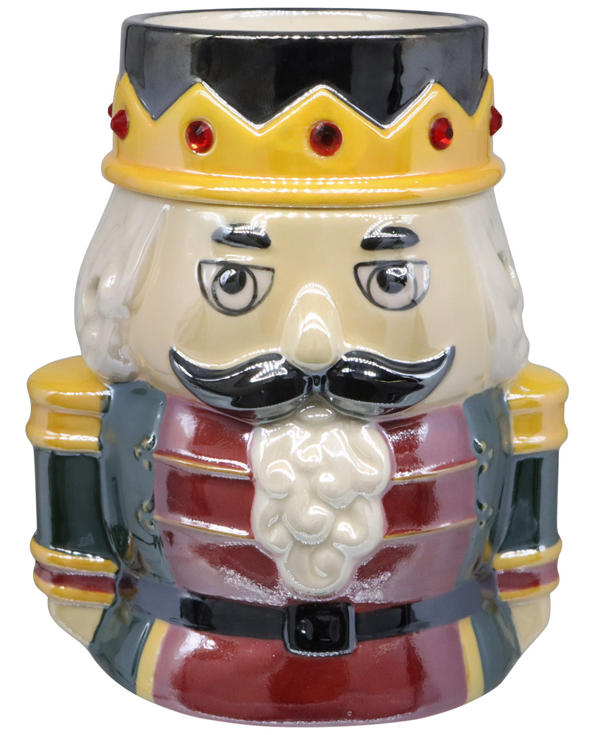 A ceramic mug shaped like a nutcracker soldier, featuring a cream-colored face and beard, a black mustache, a yellow crown with red jewel accents, and a red and gray uniform with gold trim.