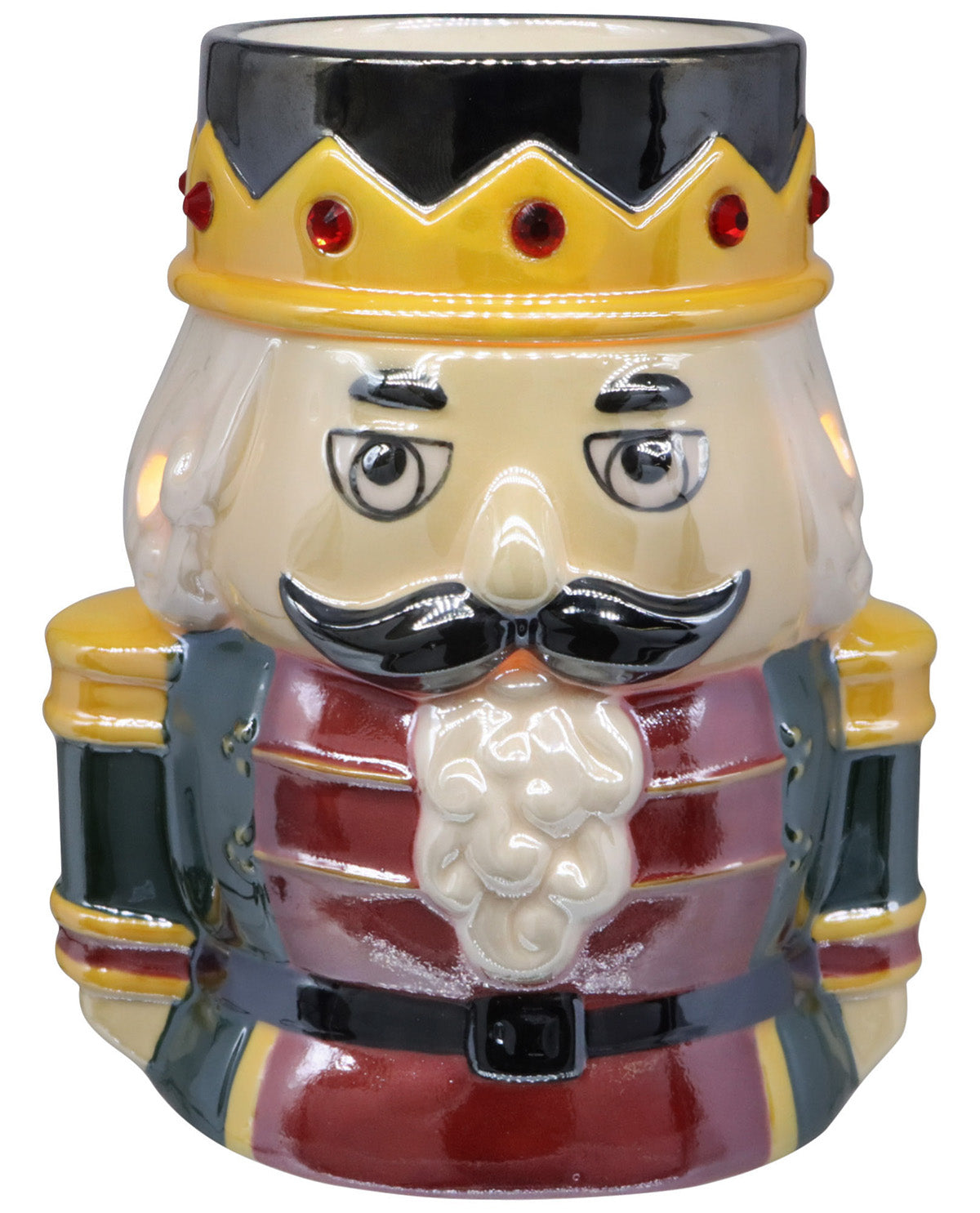 A ceramic nutcracker-shaped mug or cup featuring a glossy finish, with a gold crown, black mustache, cream face, and red and black armor details, isolated on a white background.