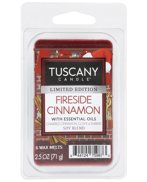 Tuscany Candle Limited Edition Fireside Cinnamon wax melt package in a clear plastic clamshell with a white hanging card, showing red wax melts and holiday-themed graphics.