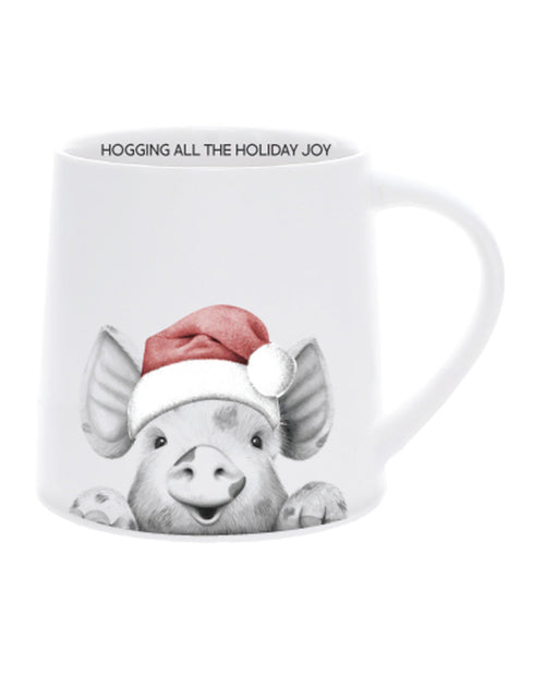 Mug with a pig wearing a Santa hat and text 'Hogging All The Holiday Joy' on a white background