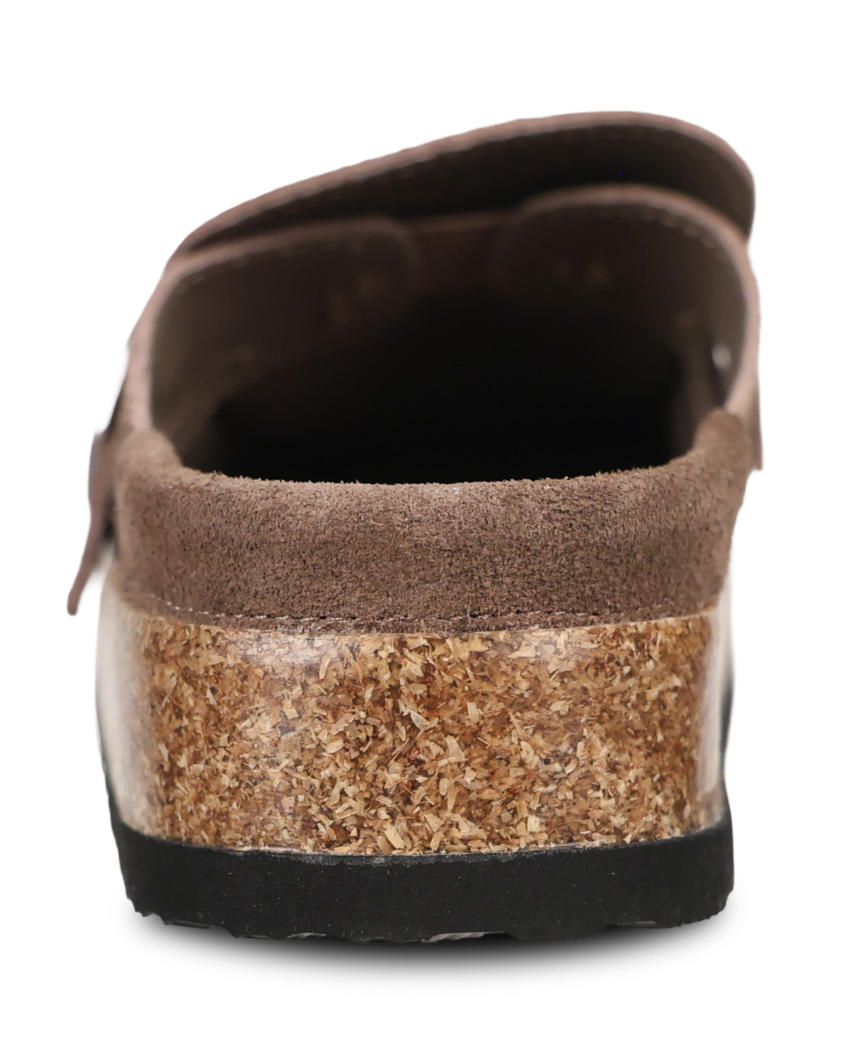 A close-up rear view of a brown clog shoe with a suede upper and a clear heel filled with shredded cork, set against a plain white background.