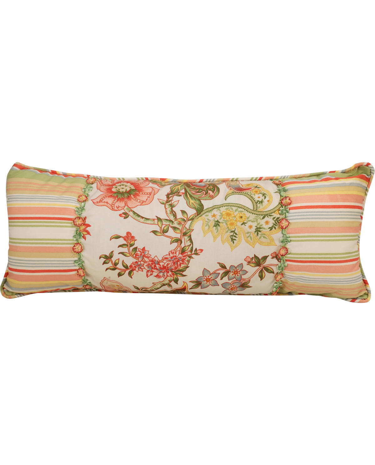 A rectangular lumbar pillow featuring a multi-colored patchwork design with striped borders in green, orange, and beige, and a central panel with a floral and botanical pattern on a cream background.