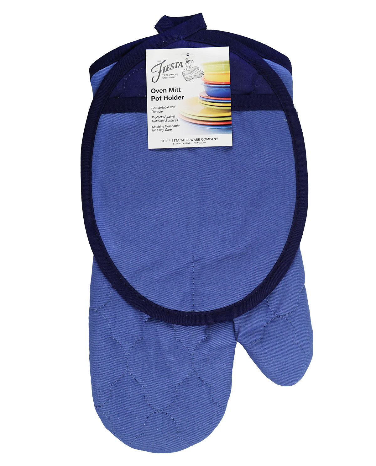 A blue quilted oven mitt with a dark navy trim, shown hanging from its original paper packaging tag on a white background.