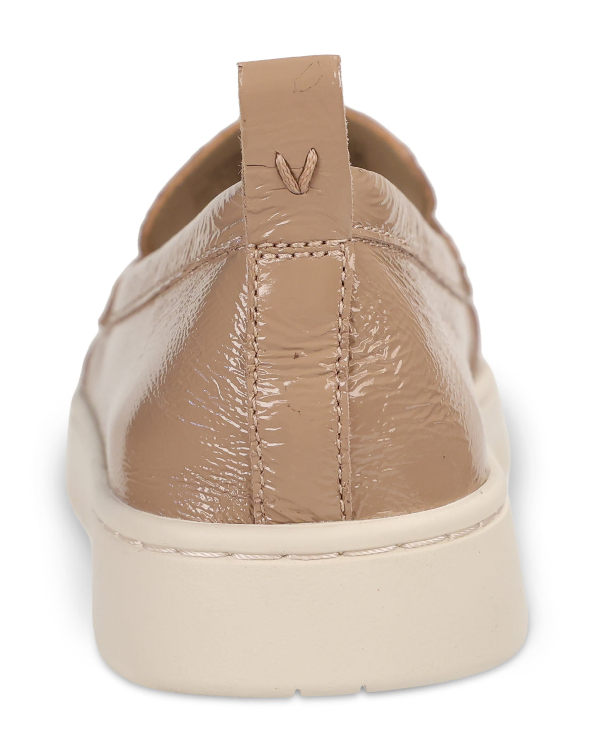 A close-up rear view of a beige patent leather slip-on shoe with a thick cream-colored sole, shown against a plain white background.