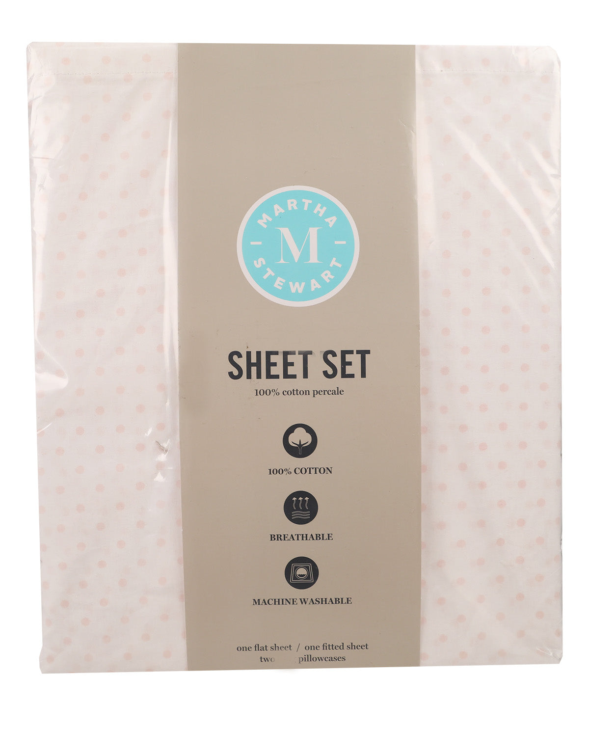 A packaged sheet set by Martha Stewart, featuring a light pink cotton percale sheet with small pink polka dots on either side of a wide taupe center label. The label includes the circular Martha Stewart brand logo and product details.