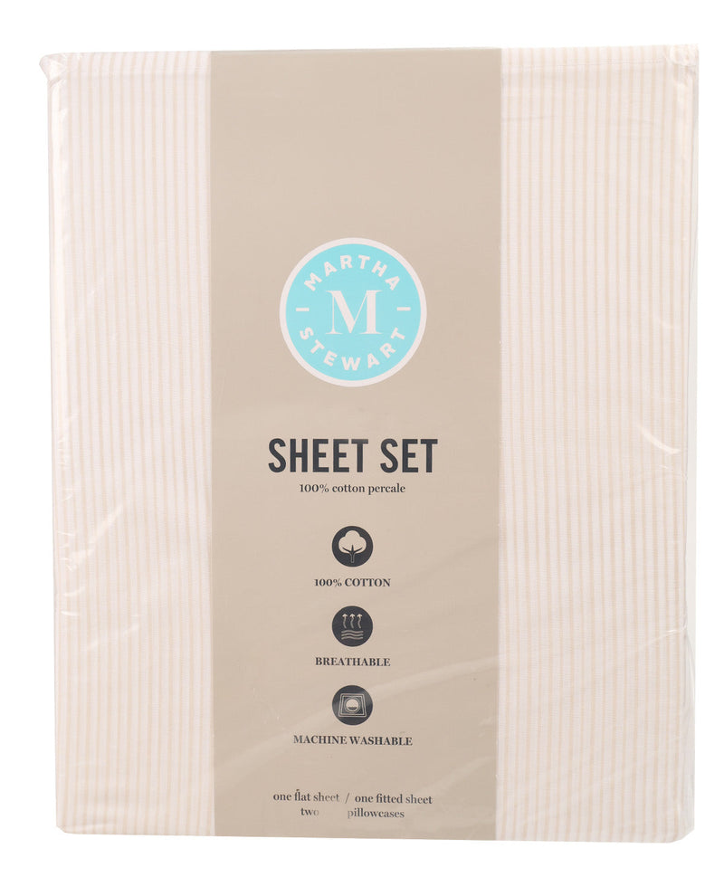 Martha Stewart Sheet Set in a cream-colored pillowcase with a central beige paper label showing the brand logo and product details.