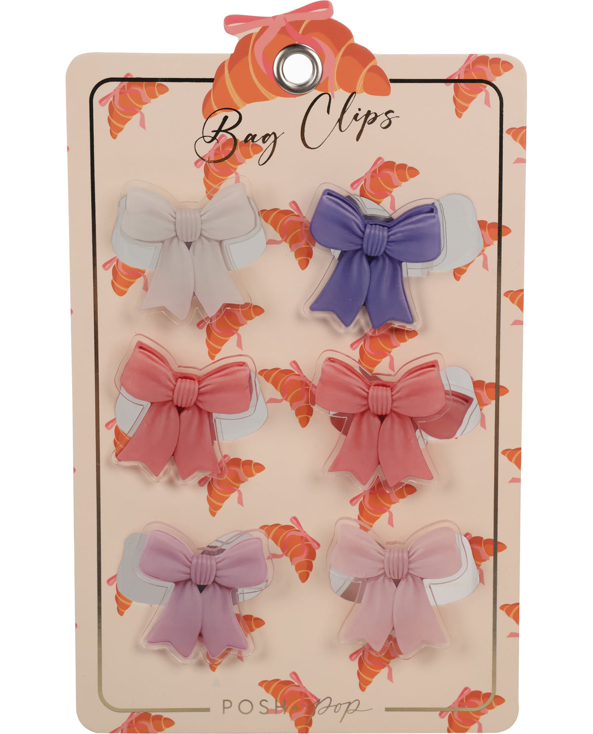 A set of six pastel-colored bag clips shaped like croissants, displayed on a decorative beige backing card with a croissant pattern. The clips come in light gray, lavender purple, coral pink, and lilac shades.