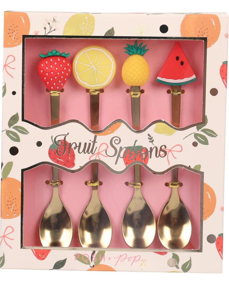 Fruit-themed spoons in a decorative gift box. The set includes four spoons with strawberry, lemon, pineapple, and watermelon handles, plus four gold spoons below, all in a pink and orange illustrated package labeled 'Fruit Spoons'.