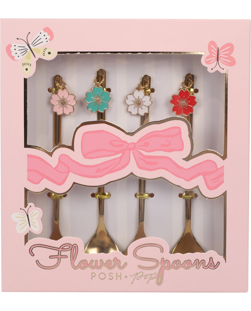 A boxed set of five decorative flower spoons in pink packaging with butterfly graphics and the text 'Flower Spoons' and 'POSH poppy'. The spoons have gold-toned handles and bowls, with floral tops in pink, teal, white, and red.