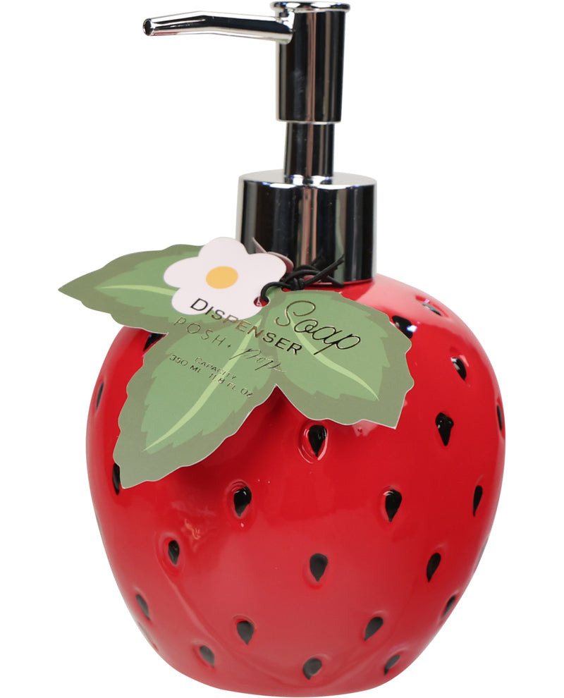 A strawberry-shaped soap dispenser bottle with a shiny red body, black seed details, a silver pump, and a paper tag with green leaves and a white flower.