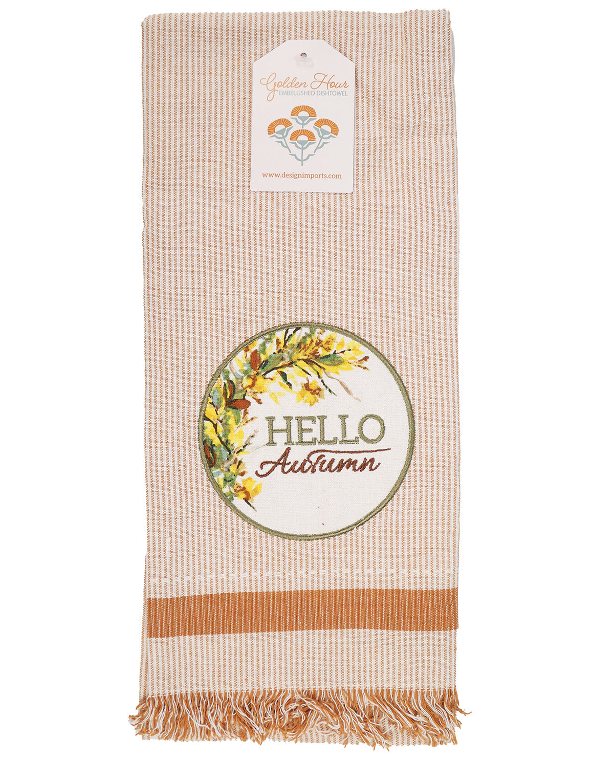A striped kitchen towel with fringe, featuring a circular 'Hello Autumn' floral design and a hanging paper tag for 'Golden Hours'.