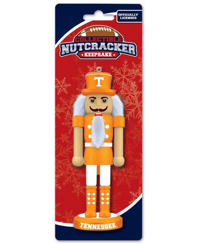 A collectible nutcracker keepsake featuring the Tennessee Volunteers logo, displayed on its original red and navy blue retail card packaging.