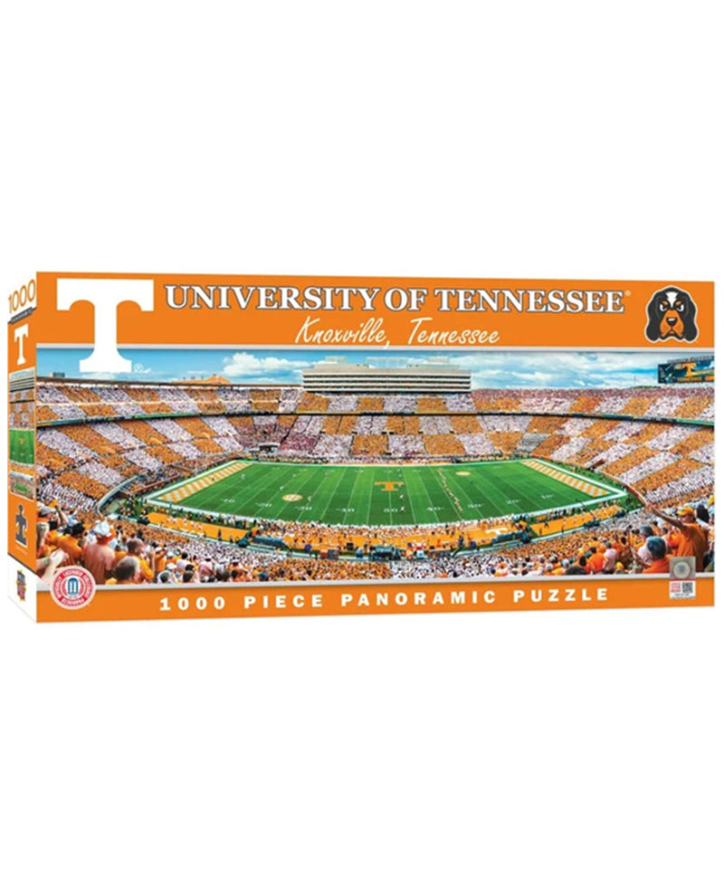 A 3000-piece panoramic jigsaw puzzle box for the University of Tennessee, featuring a vibrant stadium scene with a green football field and orange stands, on a white background.