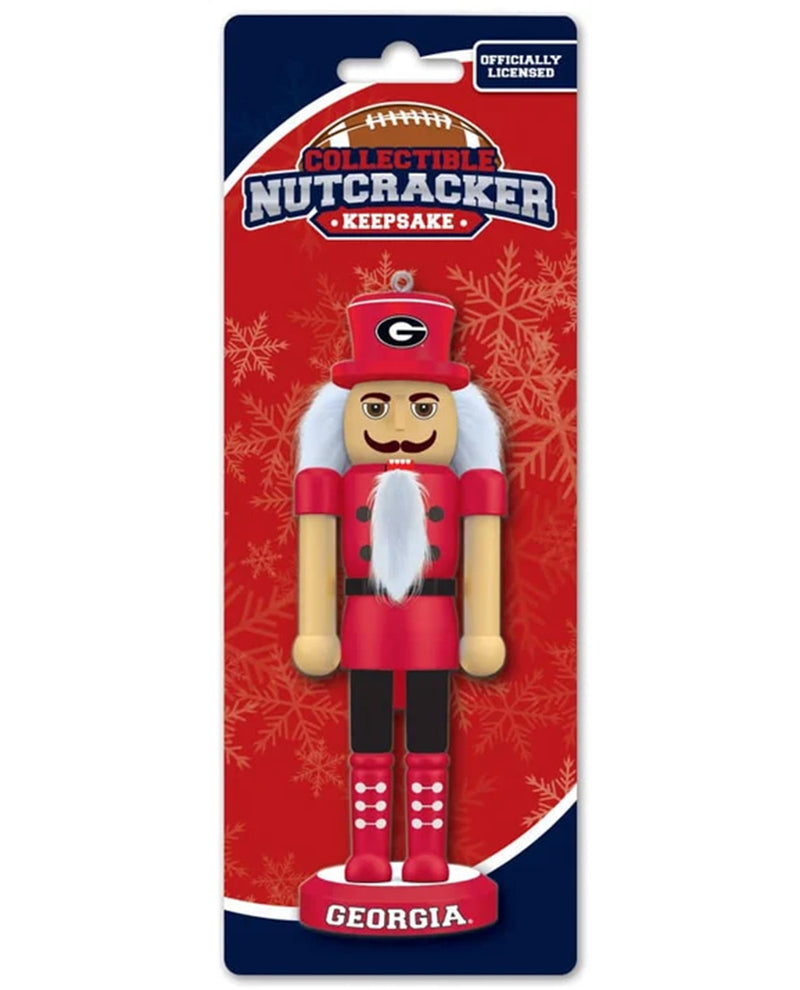 A collectible nutcracker keepsake figure of the Georgia Bulldogs, mounted on its original red and navy blue blister card packaging.