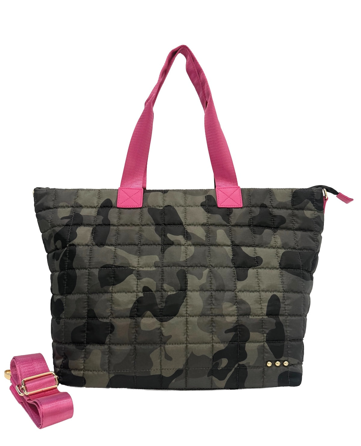 A quilted tote bag with a green and black camouflage pattern, featuring bright pink handles and a matching pink detachable shoulder strap, displayed on a solid white background.