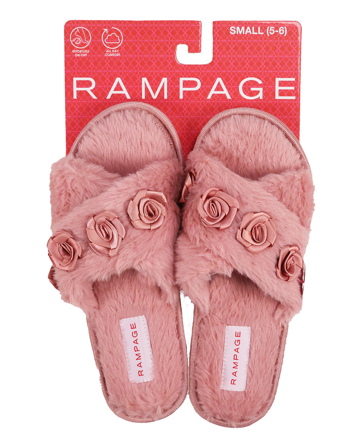 A pair of pink fuzzy slide sandals with rose embellishments on the straps, shown on their red and white Rampage retail backing card.