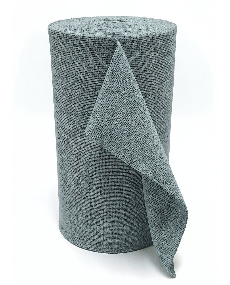 A roll of textured gray fabric or carpeting material, with one corner unrolled to show the weave, set against a plain white background.