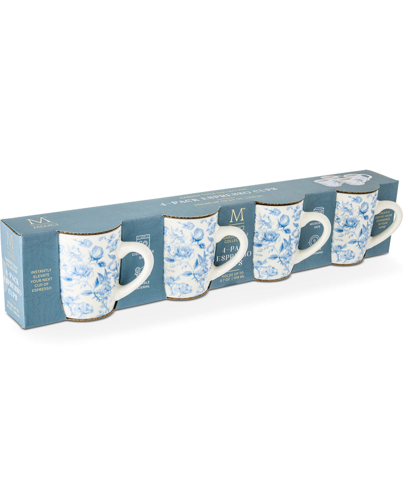 A boxed set of four ceramic mugs with a blue floral pattern and gold trim, presented in a matching blue gift box on a white background.