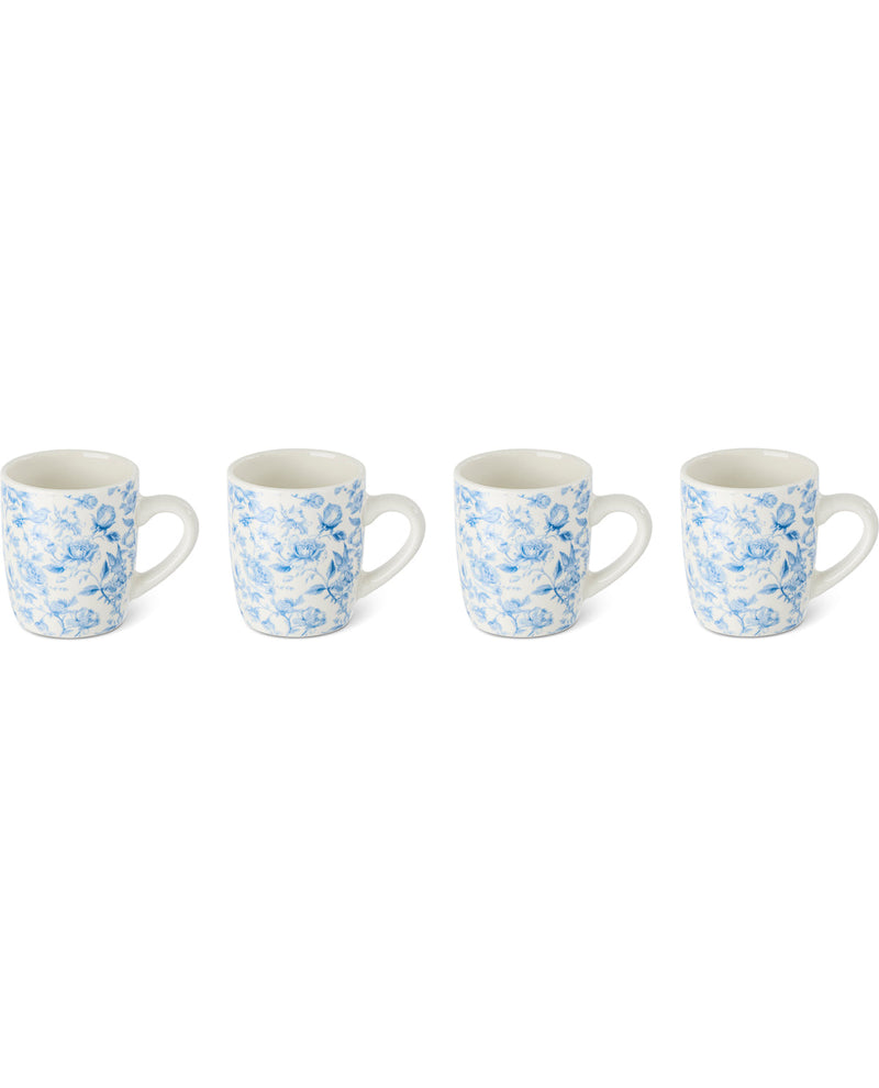 Four small ceramic mugs with blue floral patterns on a white background, arranged in a row against a plain white backdrop.